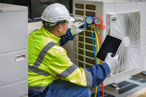 Professional Ac Installation technician working in Highland Park, PA